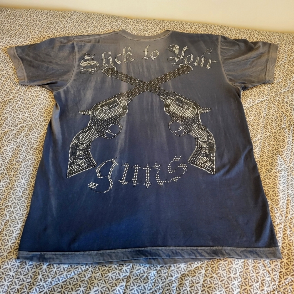 Stick To Your Guns tee designed by rawyalty